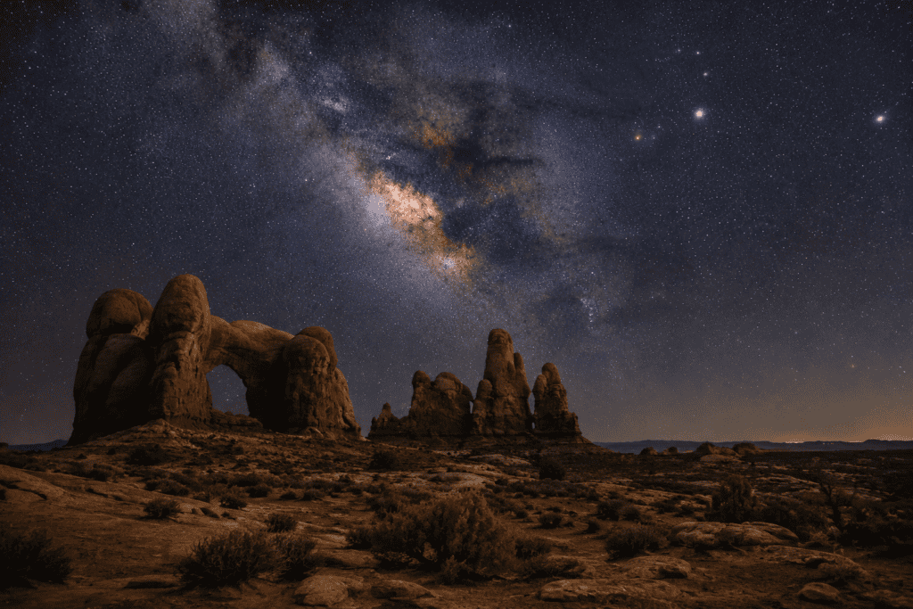 Milky Way framed by a sandstone arch in Utah
