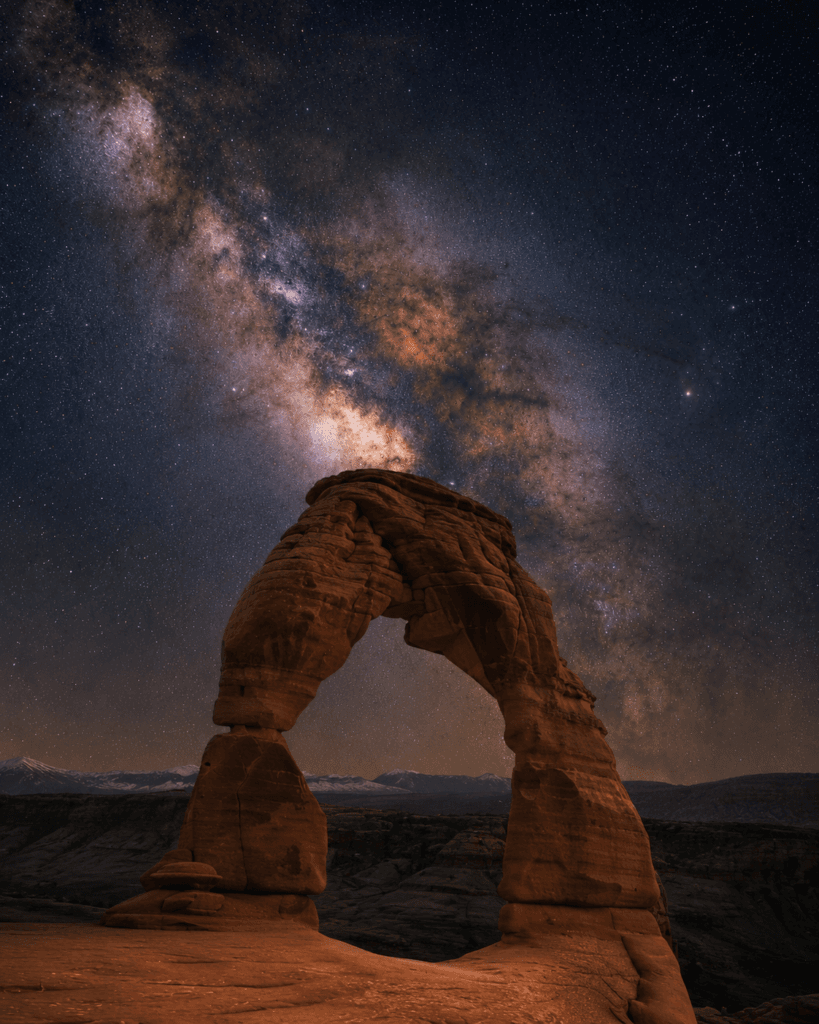 Delicate Arch under a star-filled sky
