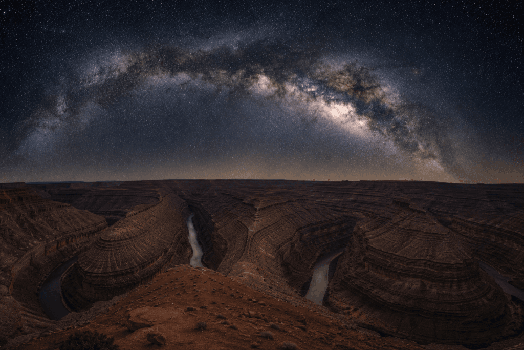 Goosenecks Overlook under a star-filled sky
