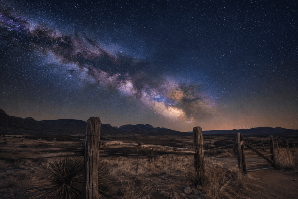 Rural Texas ranch landscape under the Milky Way